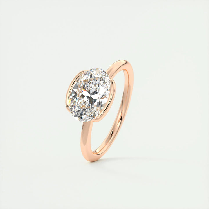 Handcrafted oval cut bezel lab grown diamond engagement ring