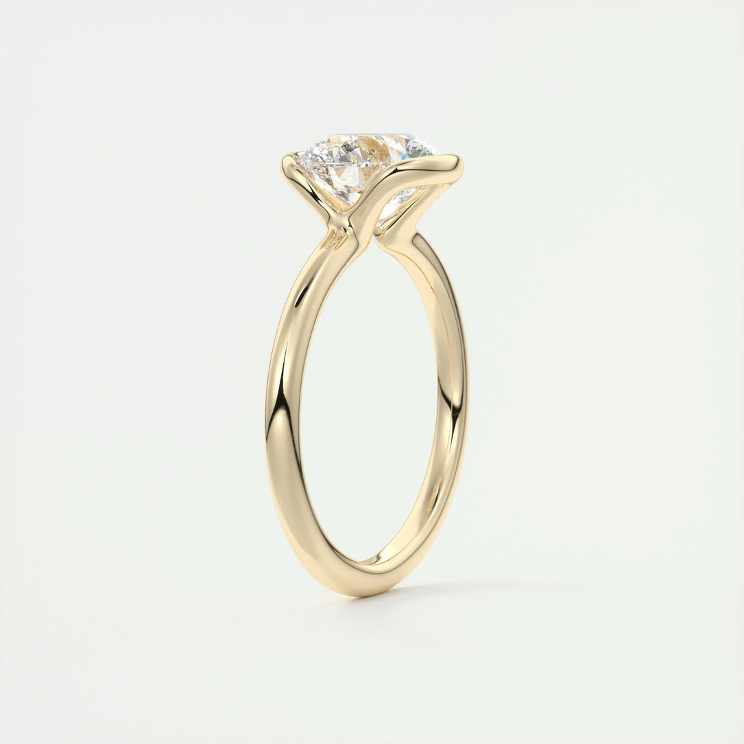 Round cut diamond ring worn on hand