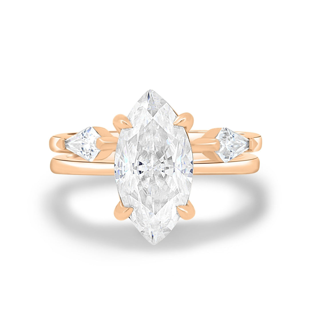 Marquise solitaire engagement ring offered in gold and platinum