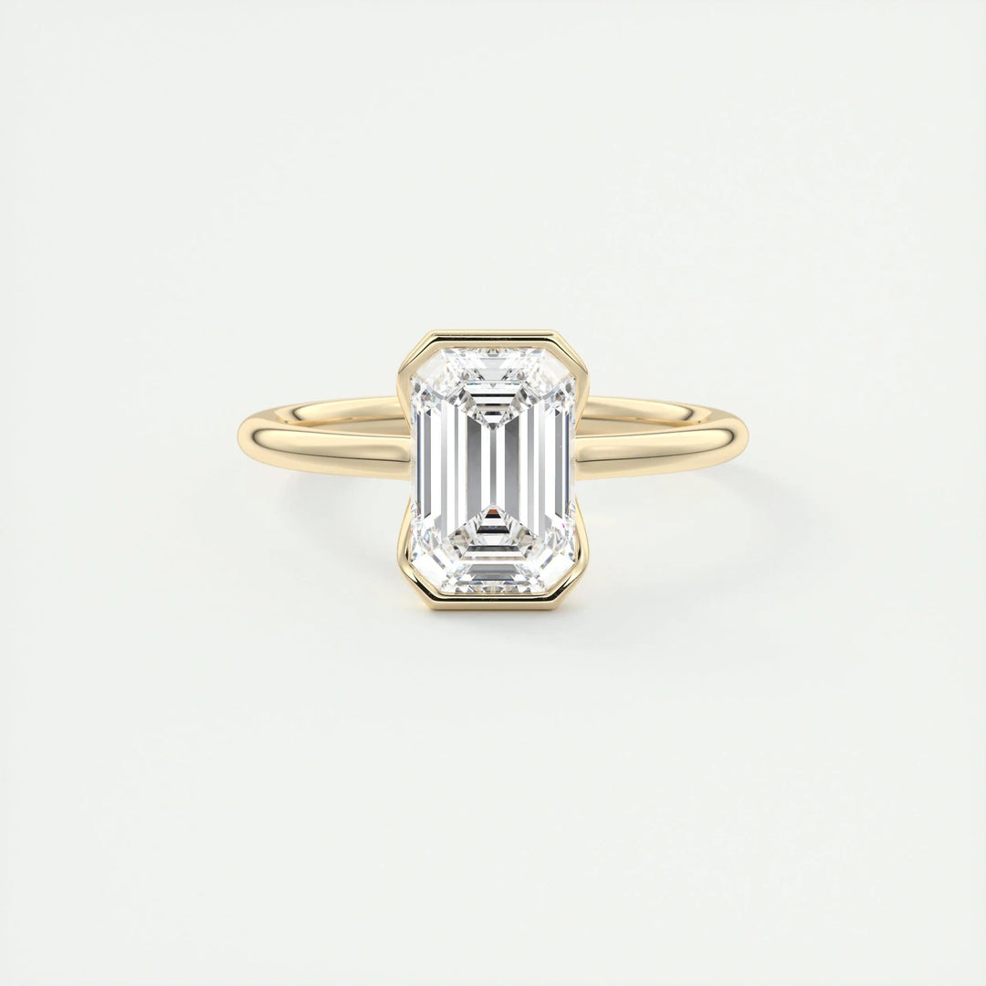 Angled view of emerald cut diamond in solitaire setting