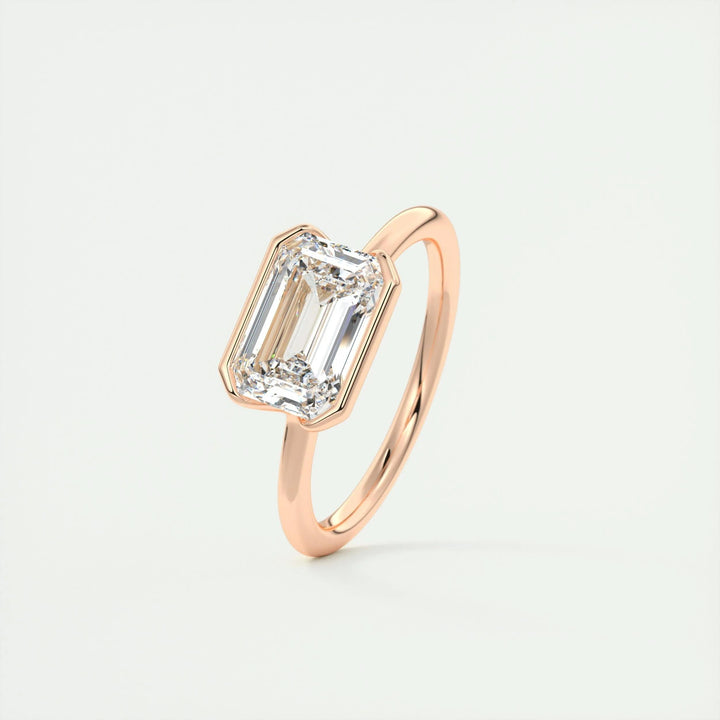 Close-up of emerald cut center diamond in solitaire engagement ring
