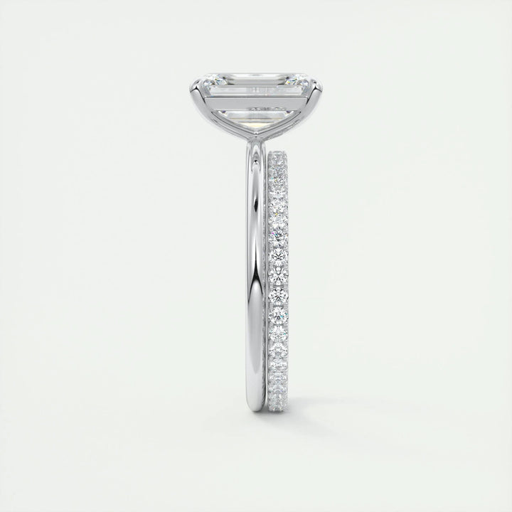 Angled view of emerald cut diamond in solitaire setting