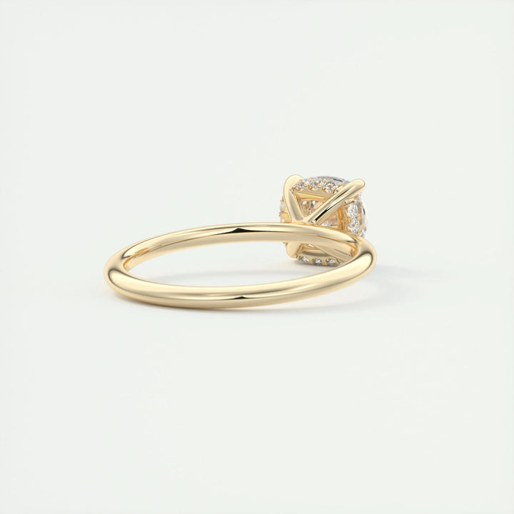 Side angle of cushion hidden halo diamond engagement ring
