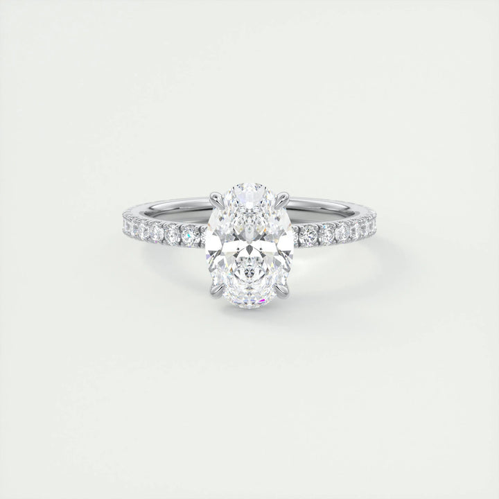 Oval pave engagement ring viewed from the side