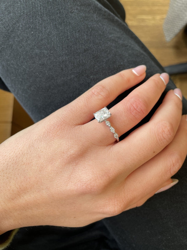 Cushion pave diamond ring presented in signature gift packaging