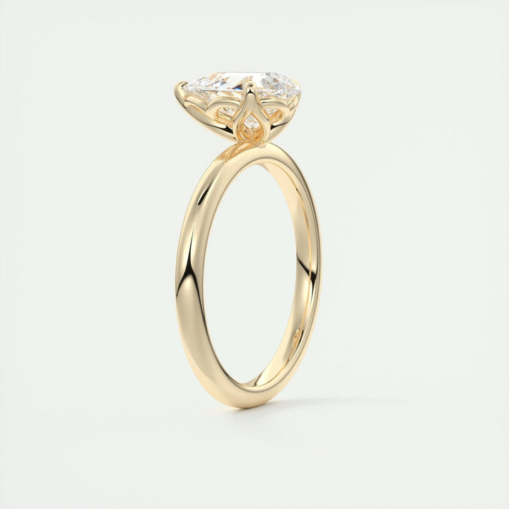 Fine craftsmanship detail on pear solitaire engagement ring