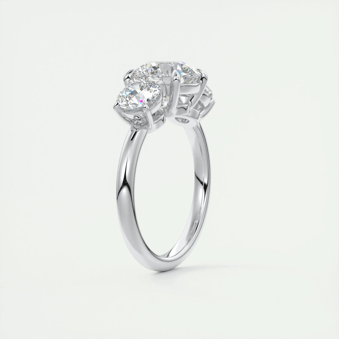 Classic round three stone engagement ring crafted for everyday wear