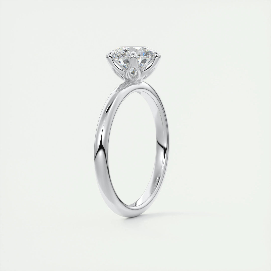 Round solitaire engagement ring with brilliant diamond sparkle