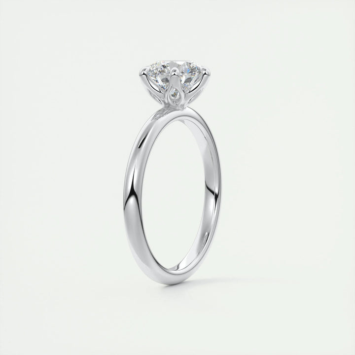 Round solitaire engagement ring with brilliant diamond sparkle