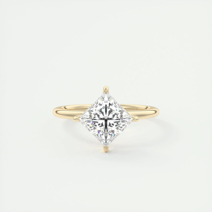Macro shot of princess cut diamond facets in solitaire ring setting