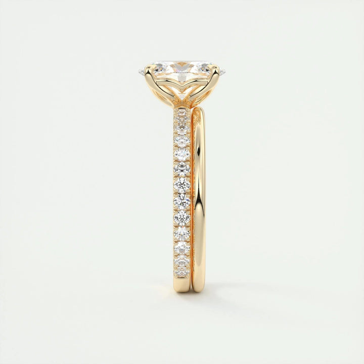 Profile view of oval cut pave engagement ring band