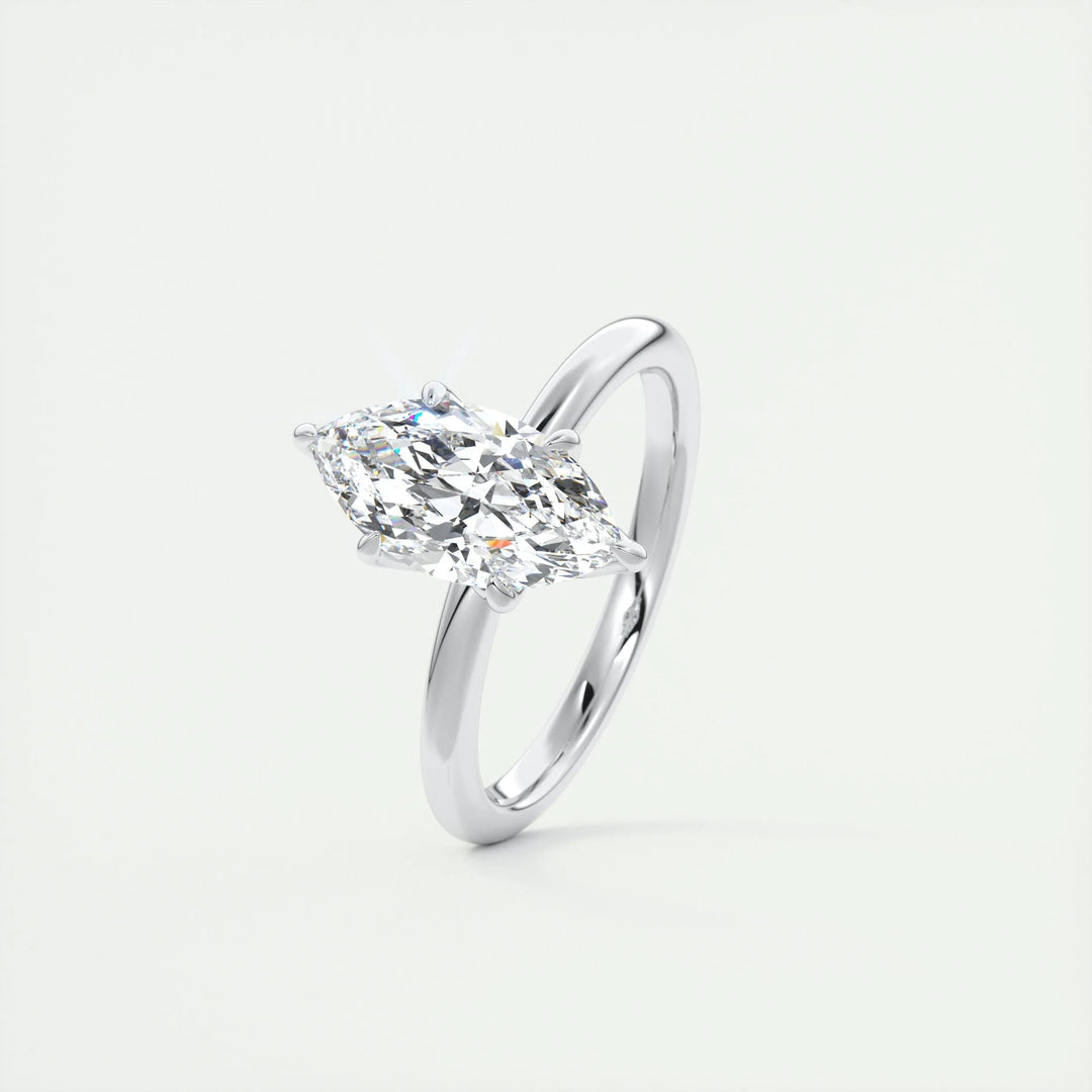 Marquise solitaire lab grown diamond ring side profile in gold setting