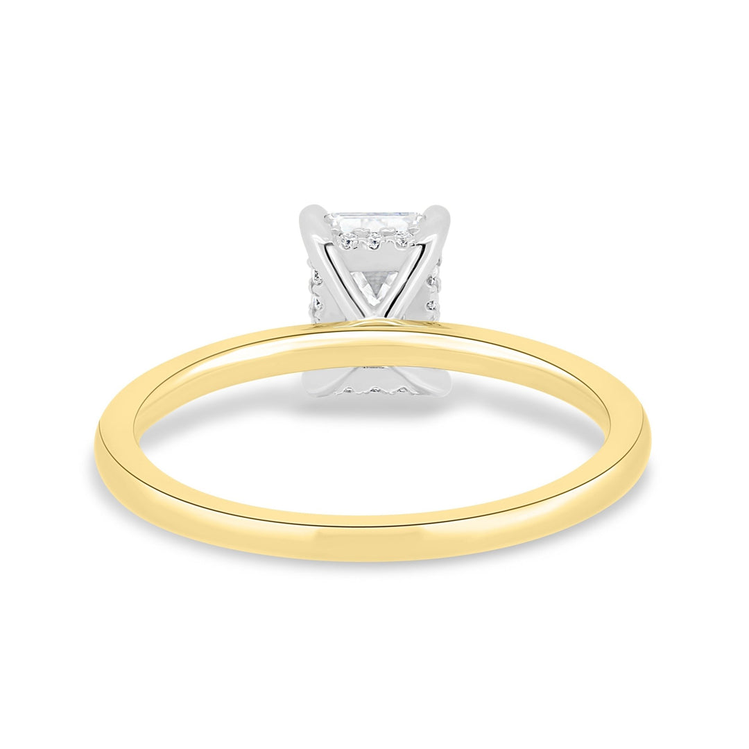 Premium emerald cut hidden halo engagement ring crafted in solid gold