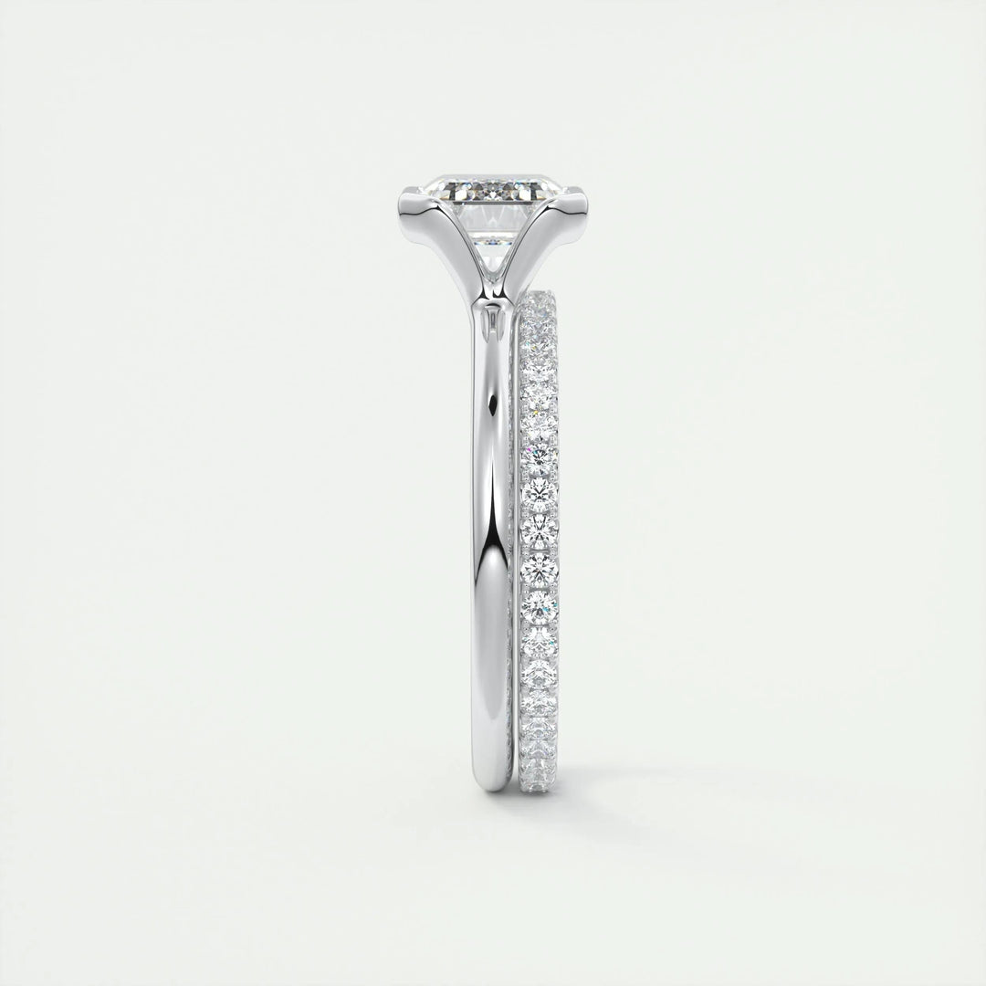 Unboxing view of emerald cut solitaire diamond engagement ring