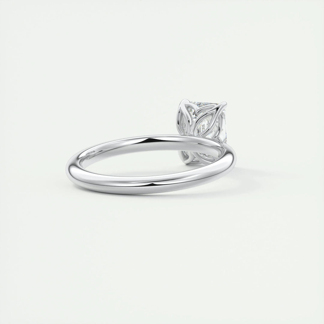 Detailed close-up of emerald solitaire diamond engagement ring