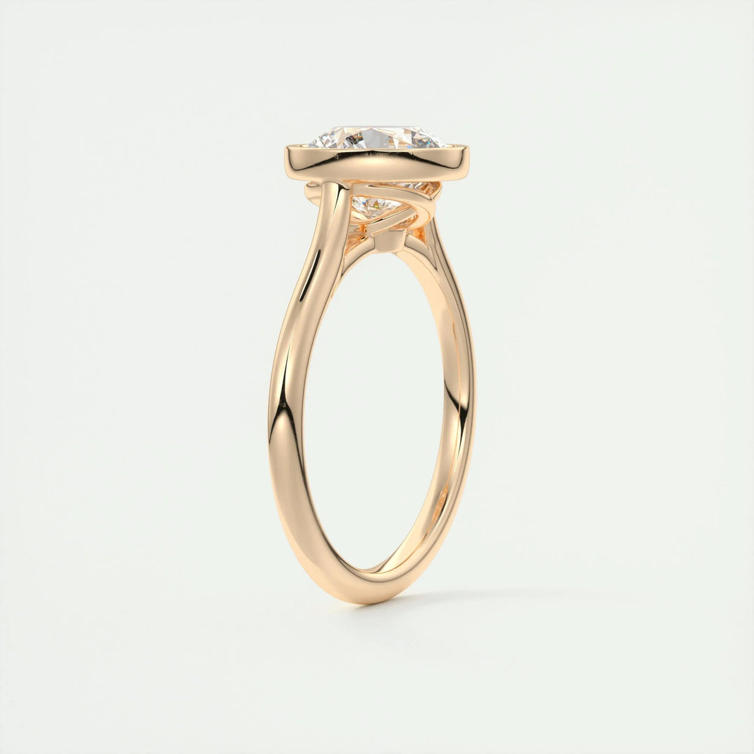 Round bezel engagement ring shown on hand for true-to-life sizing