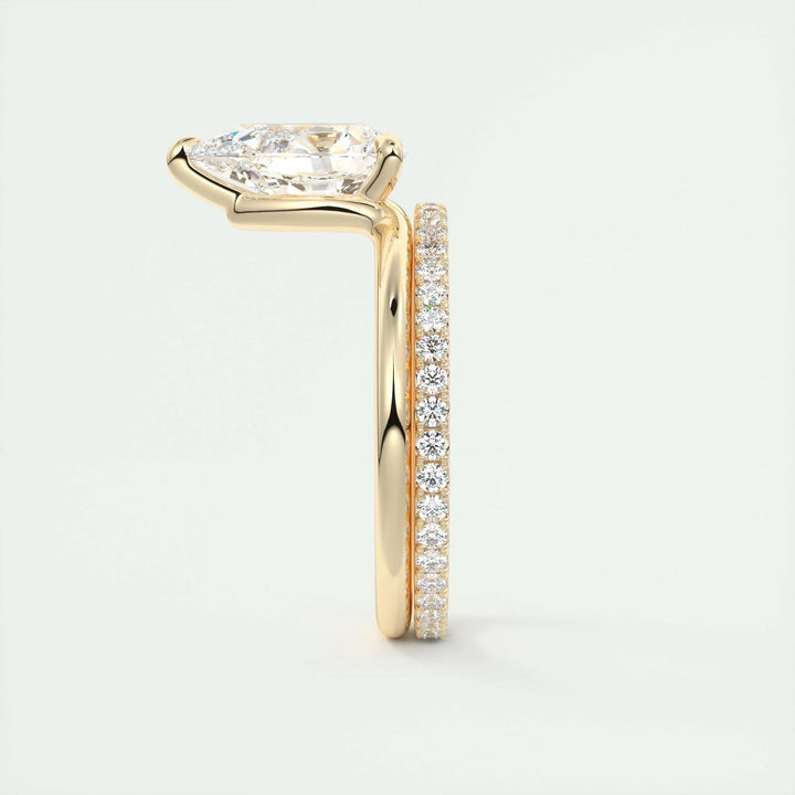 Detailed close-up of pear solitaire diamond engagement ring