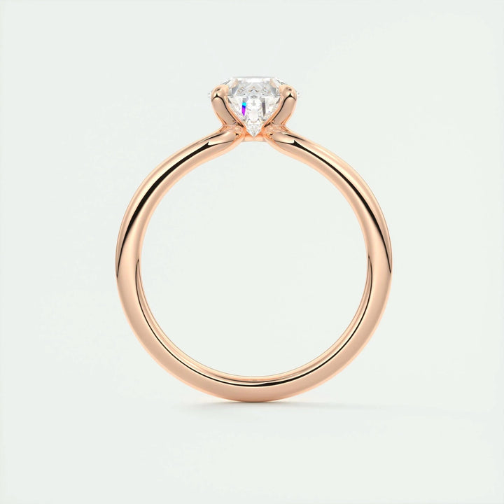 Pear cut solitaire engagement ring shown in real-life wear