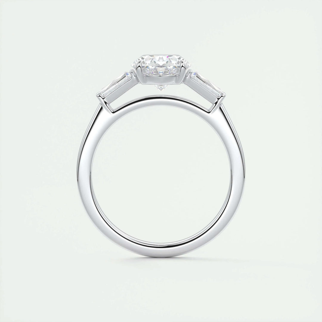 Oval three stone lab grown diamond ring fitted on finger