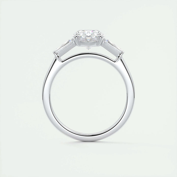 Oval three stone lab grown diamond ring fitted on finger