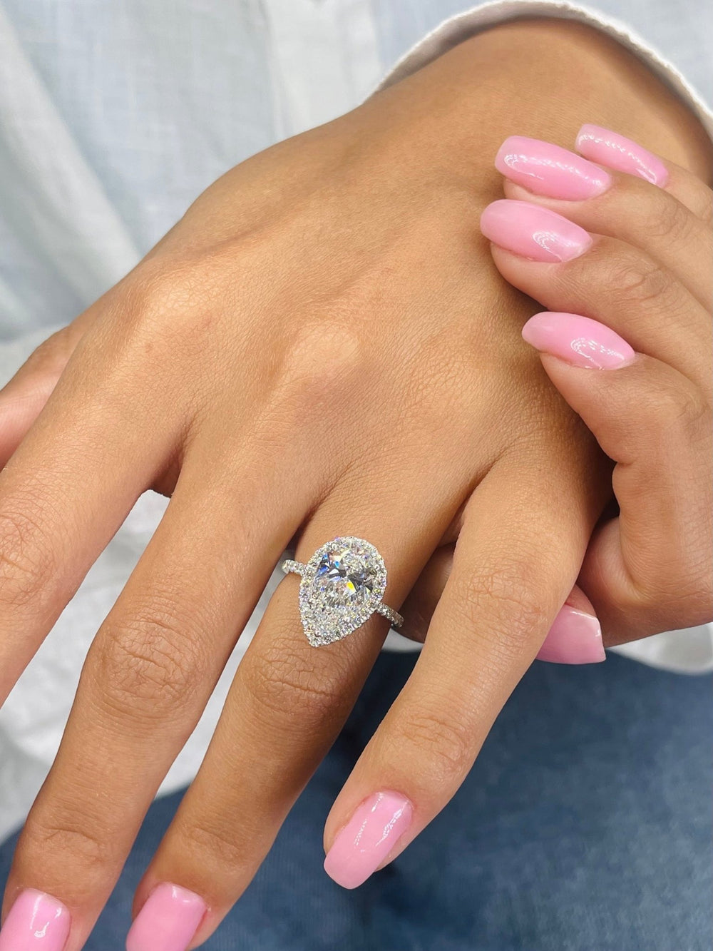 Classic pear halo engagement ring crafted for everyday wear