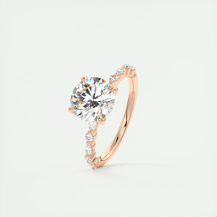 Round pave engagement ring close-up showing F-/VS1 diamond clarity
