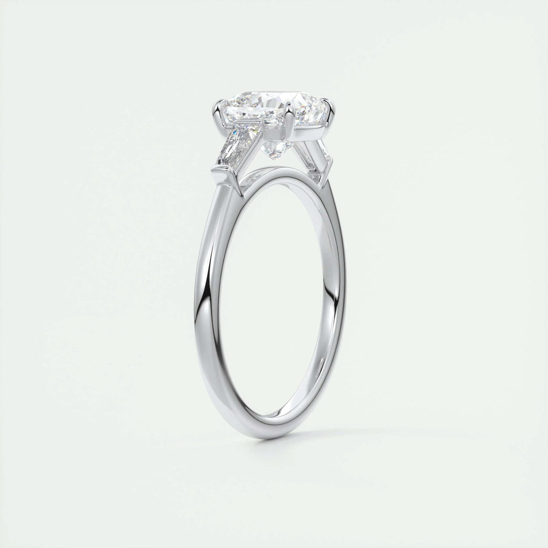 Cushion three stone engagement ring offered in gold and platinum