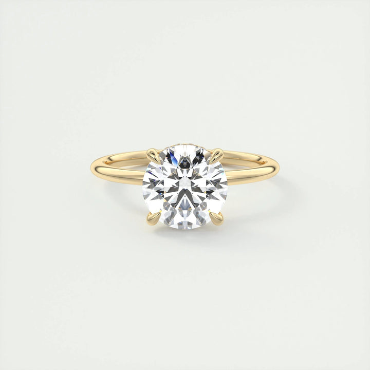 Round hidden halo lab grown diamond ring fitted on finger