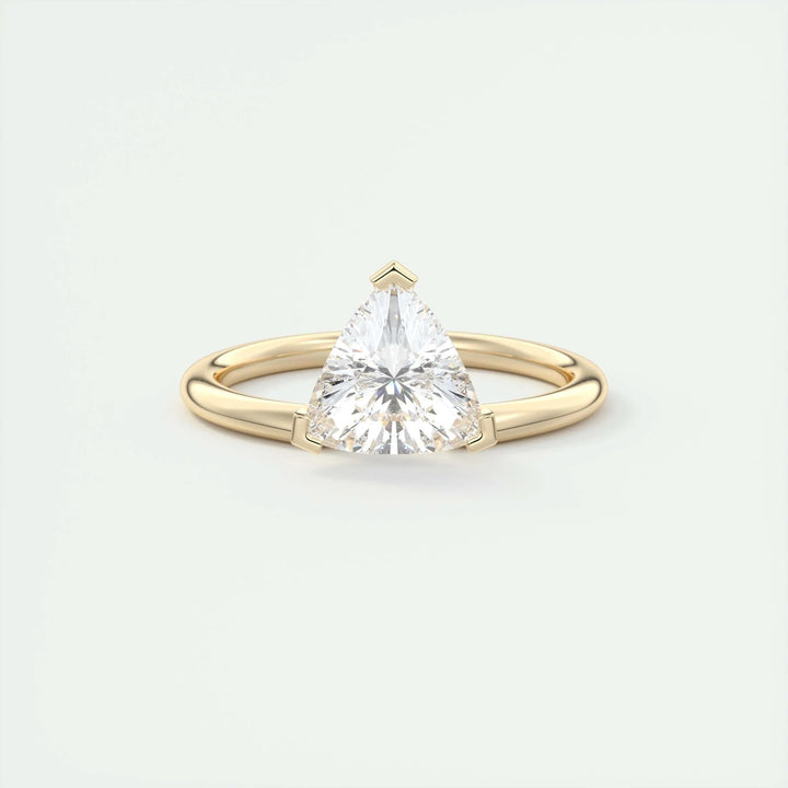 Trillion solitaire engagement ring offered in gold and platinum