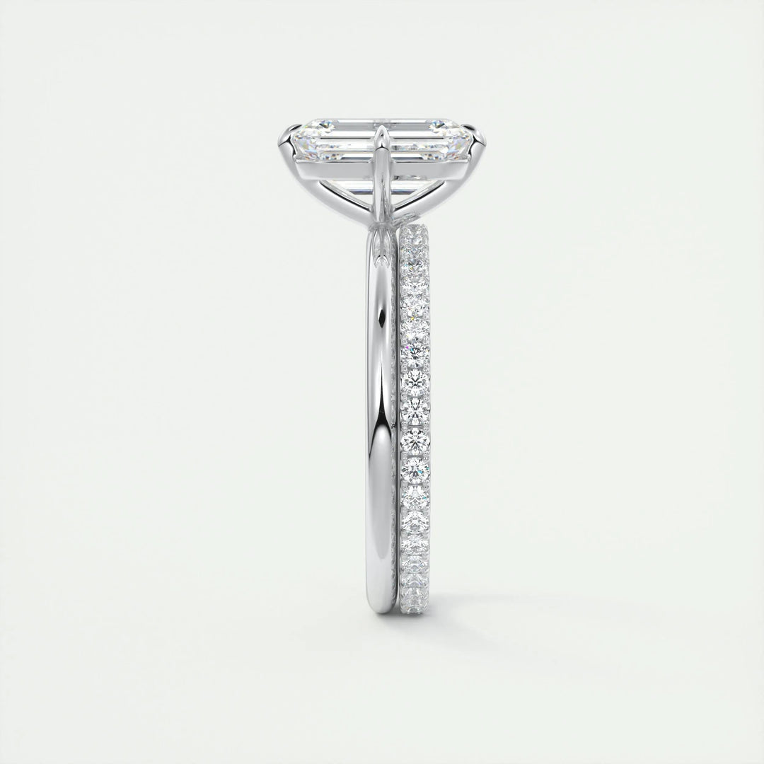 Emerald solitaire engagement ring finished in polished solid gold