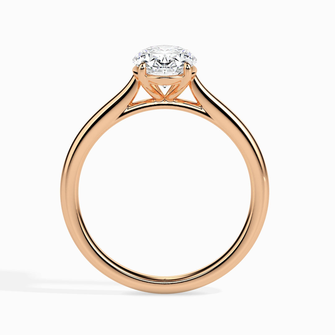 Oval solitaire engagement ring shown on hand for true-to-life sizing