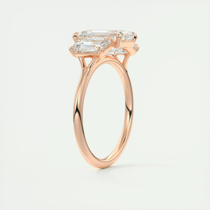 IGI certified emerald cut diamond in three stone engagement ring setting